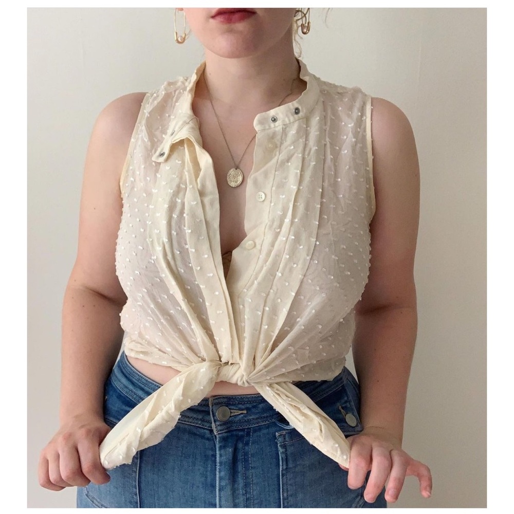 cream sleeveless button up blouse